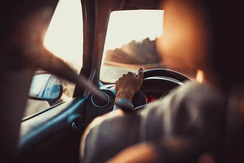 A man driving car